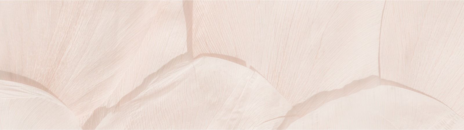 Soft peach-colored textured abstract background.