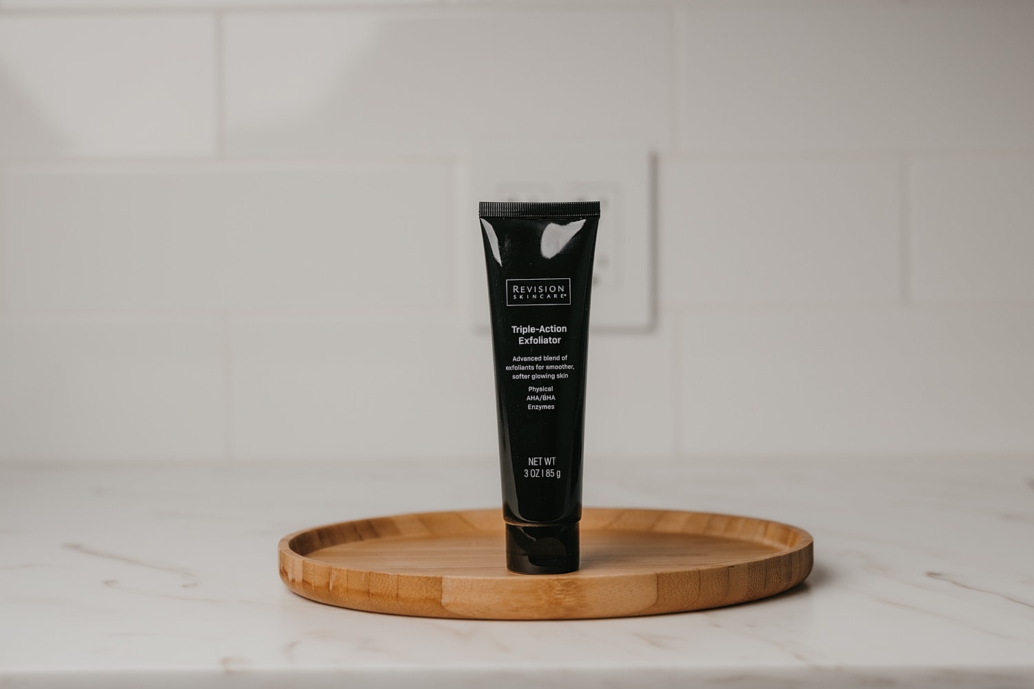 Revision Skincare Triple-Action Exfoliator on display