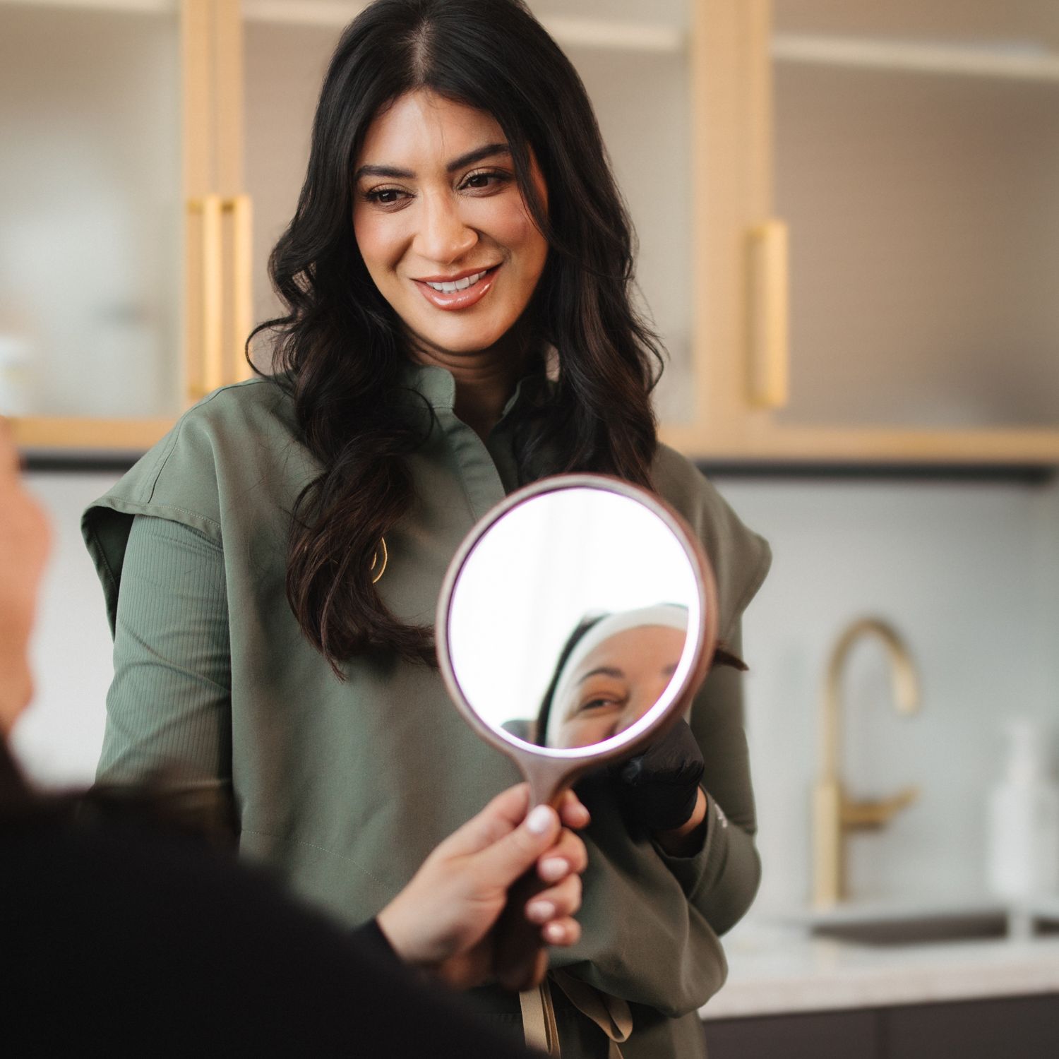 Woman practicing Pilates on a reformer machine.